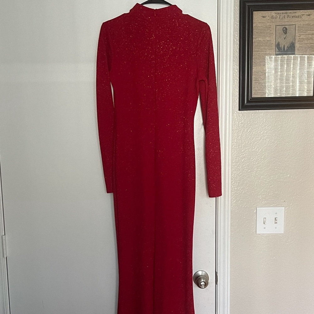Large long sleeve sparkle red dress. Perfect for the holidays.